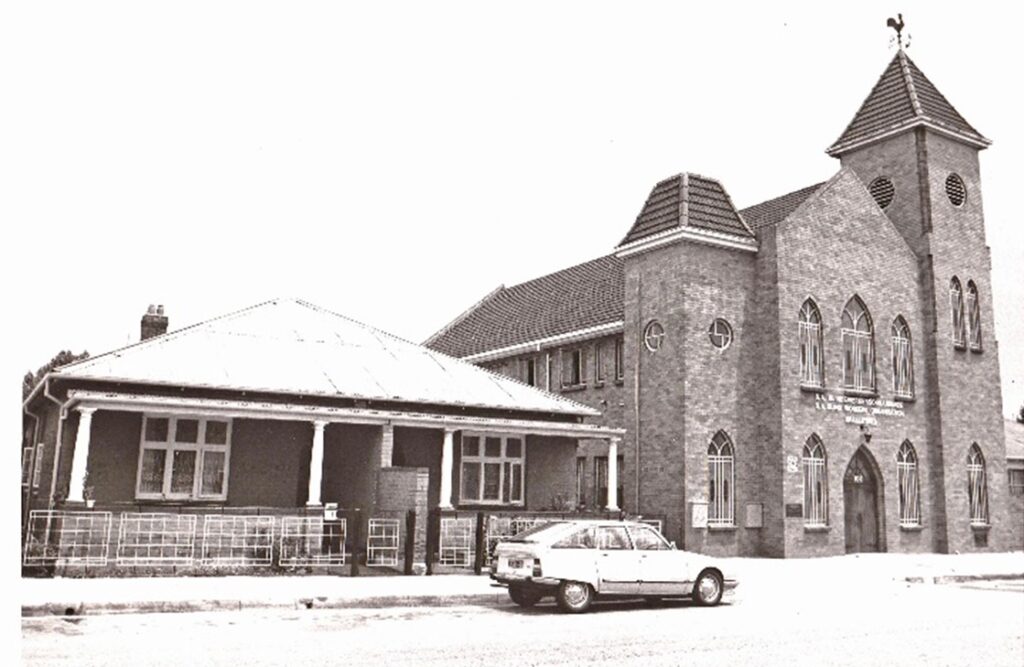 SABWO Head Office. The bell from the church tower is on display here in Alrode at the foot of the central staircase at reception.